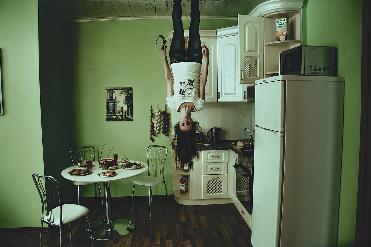 young woman, in the ceiling, head down